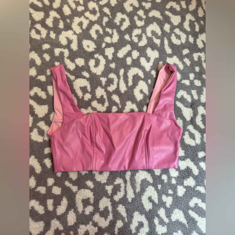 Leather pink crop. Never worn.